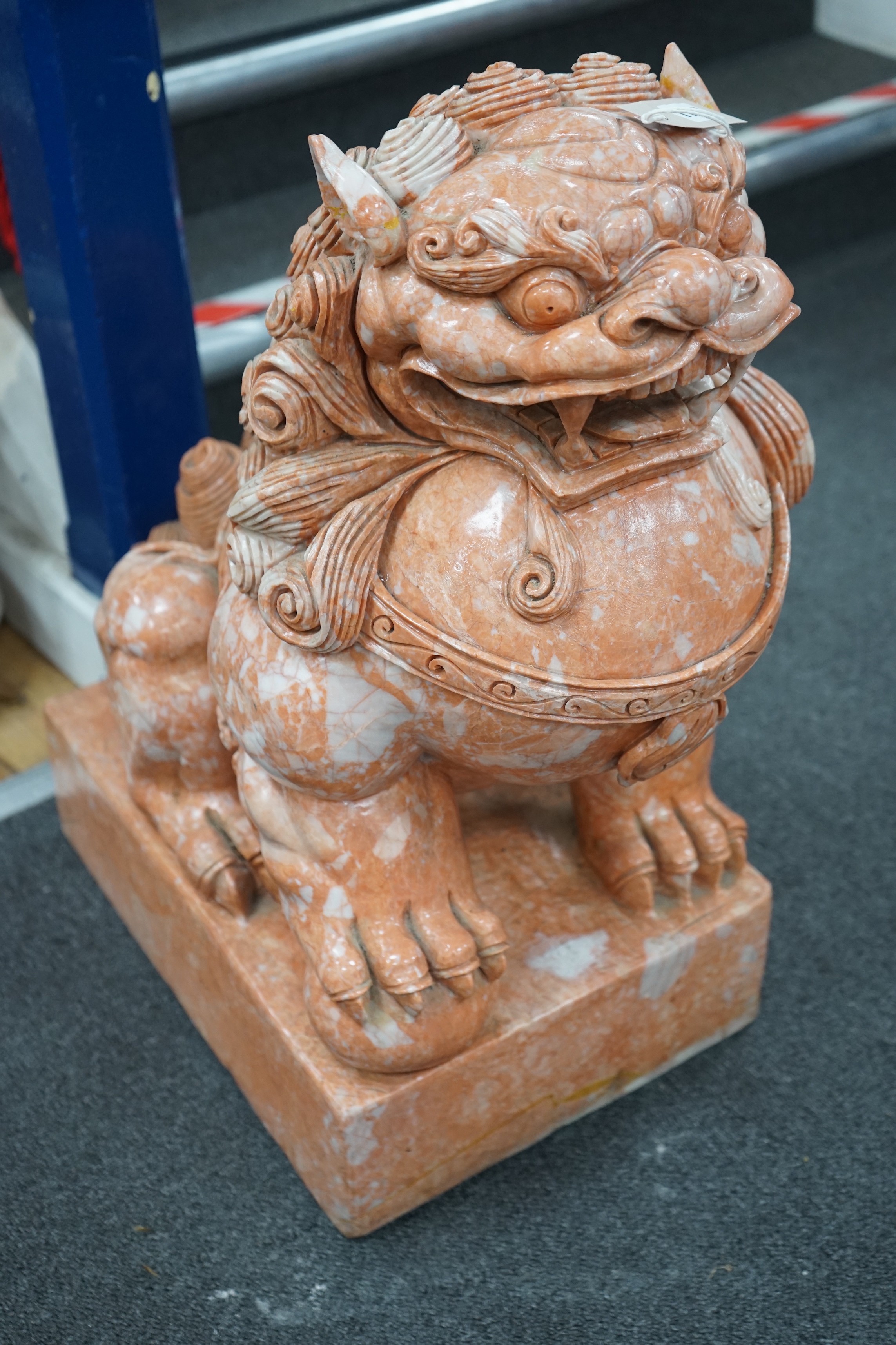 A pair of Chinese carved marble dogs of Fo, width 31cm, height 61cm